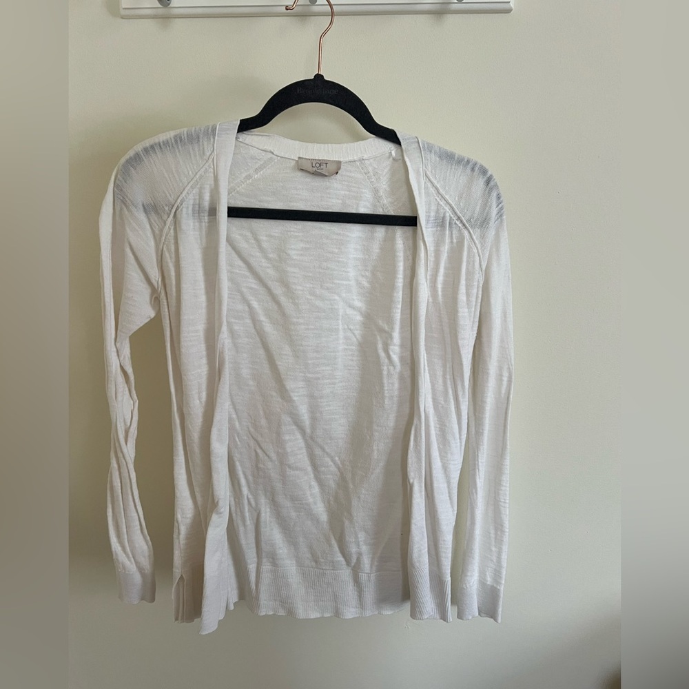 Women’s white loft sweater.